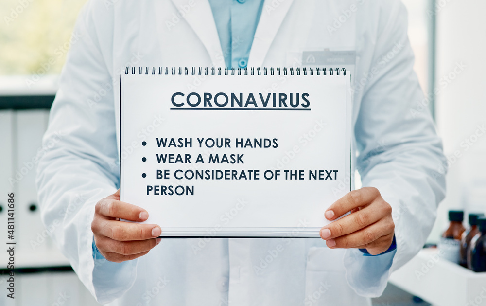 Poster Stopping the spread starts with you. Shot of a scientist holding a sign with a list of COVID-19 prevention measures on it in a laboratory.