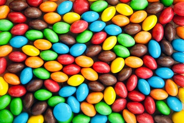 Close up of mulricolored candy, sugar coated candies. Candy delicious sweets background. Colorfull candies.