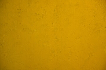 pastel yellow background from cement wall texture