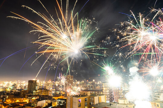 Firework display over cityscape at night, Tbilisi, Georgia