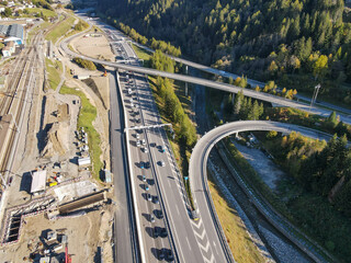 Cars in queue waiting to enter the Gotthard motorway tunnel at Airolo in Switzerland ..