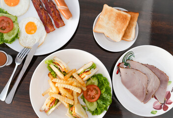 Breakfast set on wooden table.