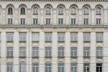 Facade of a building with monumental architecture, typical of the Stalin period (Stalinist style or...