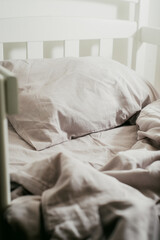 Fototapeta na wymiar linen bed on white bed