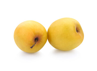 Chinese jujubes with green leaf on white background