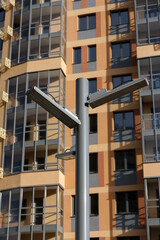 LED lighting in the life of the city. led lighting installation. Pillar with street spotlight.