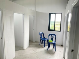 Toilet room for men with urinals sinks and mirrors