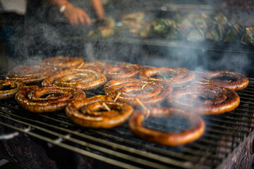 Sausages grilled in a charcoal oven, a local food of northern Thailand.