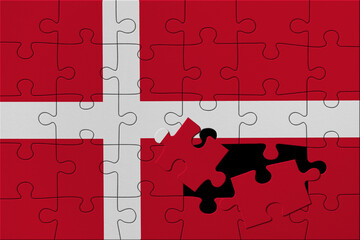 World countries. Broken puzzle- background in colors of national flag. Denmark