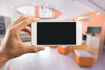 Covid pass certificate at airport. Digital gadget with a blank screen