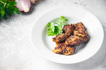 fried liver offal pork, beef healthy meal food snack on the table copy space food background rustic top view keto or paleo diet