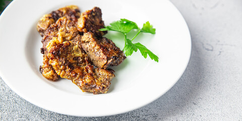 fried liver offal pork, beef healthy meal food snack on the table copy space food background rustic top view keto or paleo diet