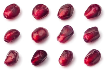 Set of garnet fruit seeds isolated on white background. Collection of pomegranate seeds closeup