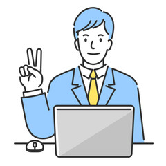 ノートパソコンの前に座って2本指を立てて2番目のポイントを説明する笑顔の若いビジネスマン。あるいはVサインをしています。