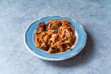 Fresh Pasta with Meatball, Tomato Sauce and Grated Cheese. Original Italian Recipe.
