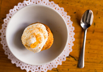 Delicious dessert - carrot cake with orange crumbs clos eup