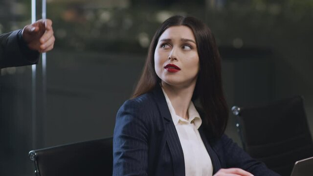 No to sexual harassment. Lustful man boss touching his female assistant at office, unhappy woman rejecting molestation