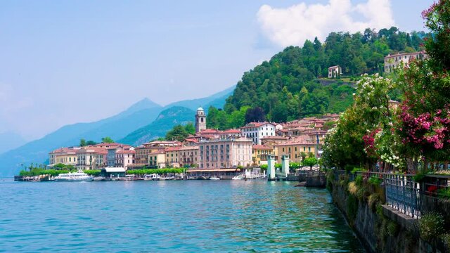 Bellagio borgo on Lake Como, Italy. Romantic scenery of coast and lakefront, the town is famous for popular luxury resort, stores, narrow streets and alleys. RAW CINEMATIC 4K FOOTAGE
