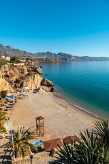 Calahonda beach in the town of Nerja one spring afternoon, Andalusia. Spain. Costa del sol in the Mediterranean Sea. - obrazy, fototapety, plakaty