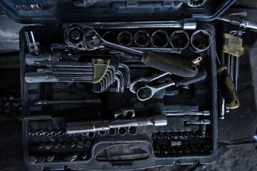 Tools in car service, equipment for restoration and fixing car in garage