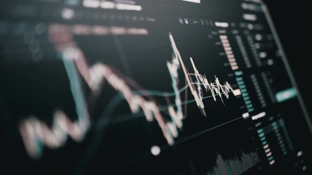 Trader Analyzes Candlestick Chart of Movement of Cryptocurrency on Screen PC. Online viewing of cryptocurrency quotes btc, eth chart in the application. Dynamics, statistics, stock exchange data.