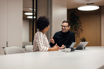 Happy caucasian man, excited about working with his new colleague.