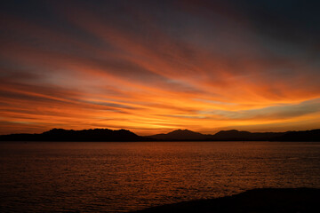 sky sunset over the sea an mountains