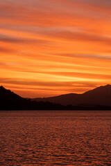 sky sunset over the sea an mountains