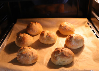 Homemade spelled rolls in the oven