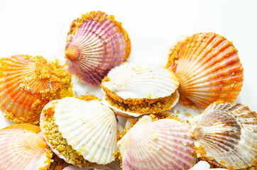 Mini coquilles St. Jacques, Natural scallop shells filled with Patagonian scallops and Thermidor sauce topped with a ciabatta breadcrumb topping