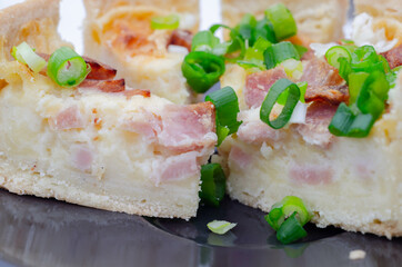 Quiche Lorraine, smoked bacon with medium  and mature cheddar cheese and egg quiche filling in a shortcrust pastry