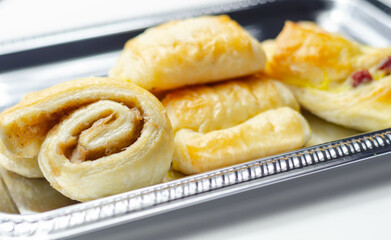 Set of various traditional pastry sweet mini Danish on the silver tray