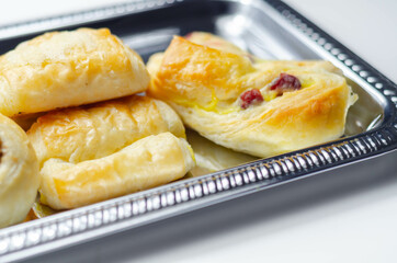 Set of various traditional pastry sweet mini Danish on the silver tray