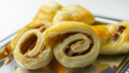 Set of various traditional pastry sweet mini Danish on the silver tray