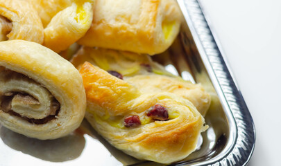 Set of various traditional pastry sweet mini Danish on the silver tray