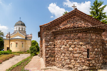 The courtyard of the Kremikovtsi Monastery with the old and new church. The Monastery of Saint George is a Bulgarian Orthodox monastery near Kremikovtsi to the northeast of the Bulgarian capital Sofia