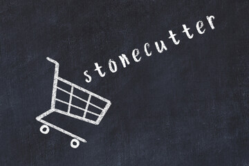 Chalk drawing of shopping cart and word stonecutter on black chalboard. Concept of globalization...