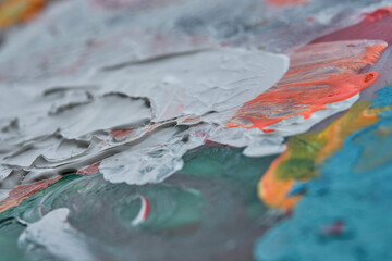 Vibrant multi-coloured artists traditional oil paint palette