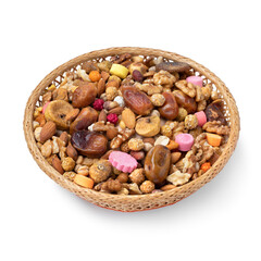Traditional Moroccan Ashura snack in a basket isolated on white background