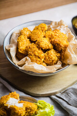 vegan chicken nuggets on a table with sides