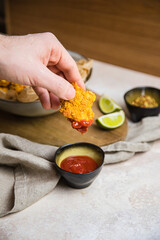 vegan chicken nuggets on a table with sides