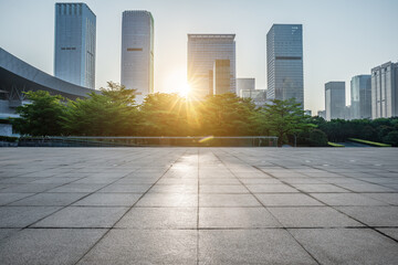 Empty square floor and city skyline with modern commercial office buildings in Shenzhen, China.