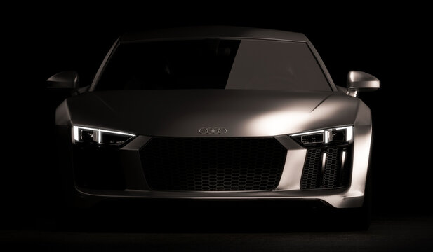 Almaty, Kazakhstan - Jan 15.2022: New Audi R8 V10 Plus luxury super car on dark background. 3d render