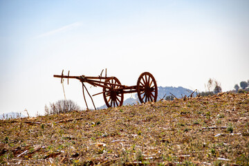 Traditional wooden cart in a field