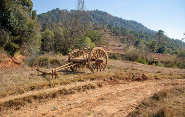 Traditional wooden cart in a field