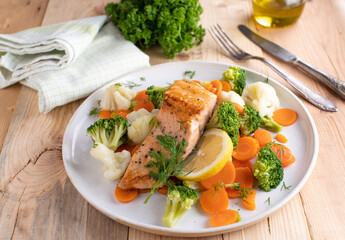 Salmon with imperial vegetable on a plate