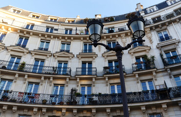 Fototapeta na wymiar The facade of Parisian building, France.