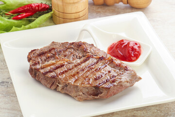 Grilled rib-eye steak beef meat