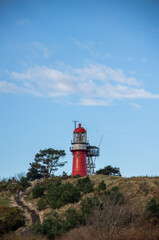 Fototapeta na wymiar Old lighthouse on a hill