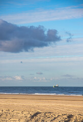 Huge ship passing the beach